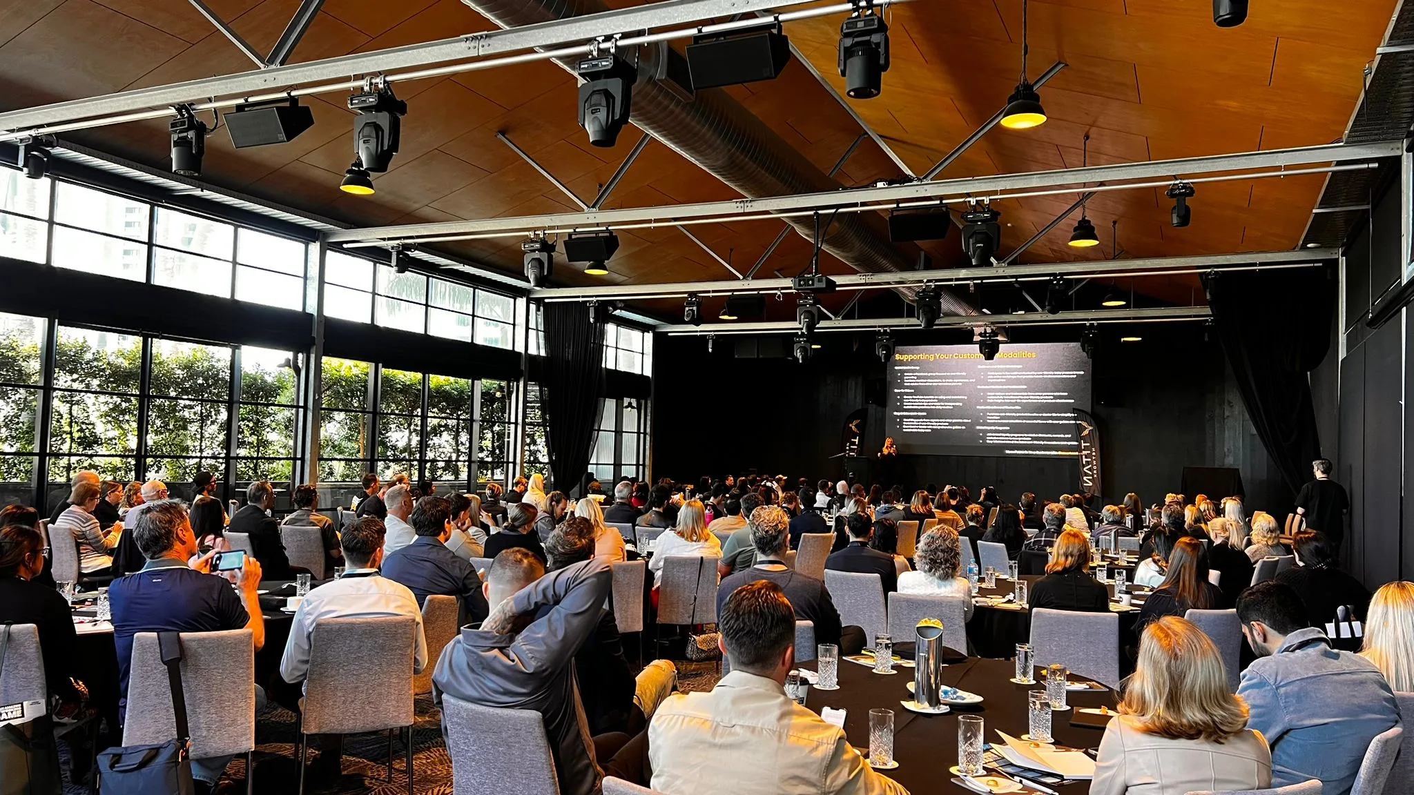 A packed Titan mastermind room